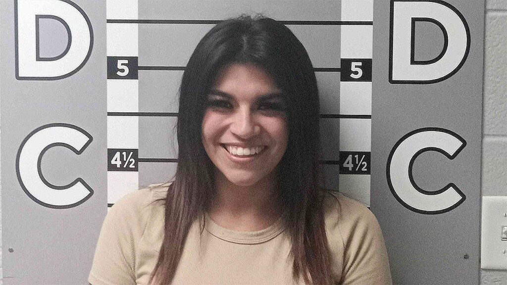 Kentucky woman's smiling mugshot goes viral after allegedly smashing ex's car