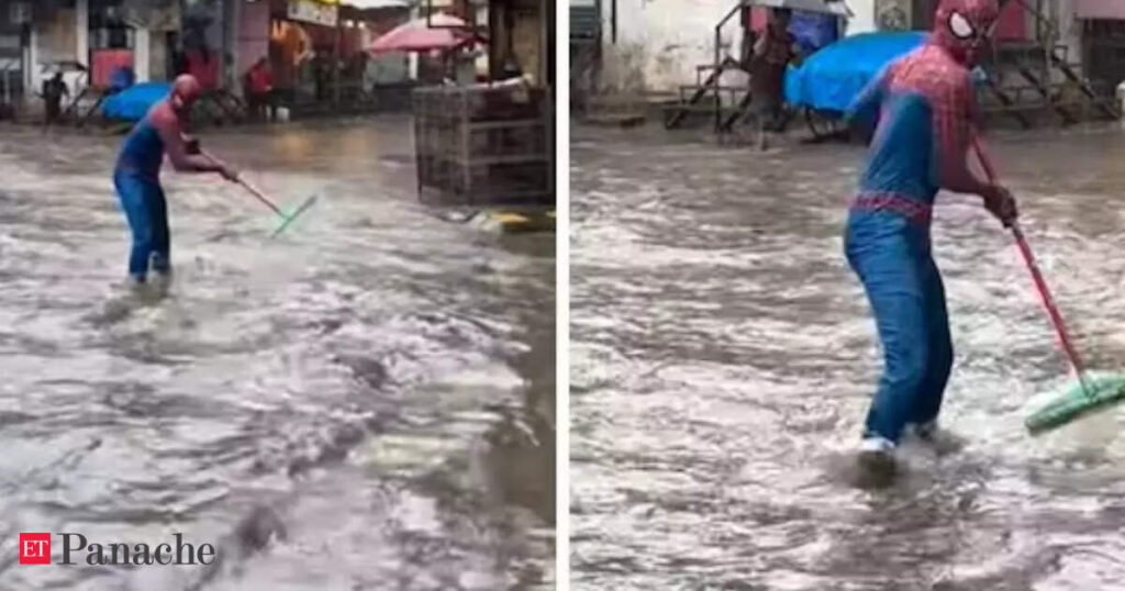 Mumbai rains: 'Spiderman' spotted trying to clean waterlogged streets in viral video. Netizens quip: 'Water Away From Home'