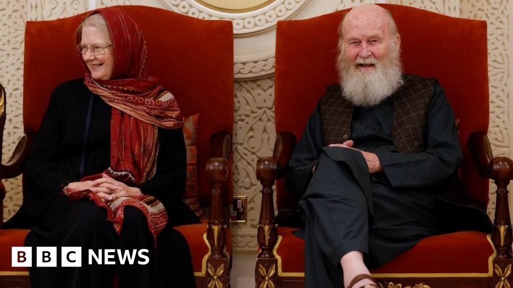 Son of British couple held by Taliban 'ecstatic' as they return to UK