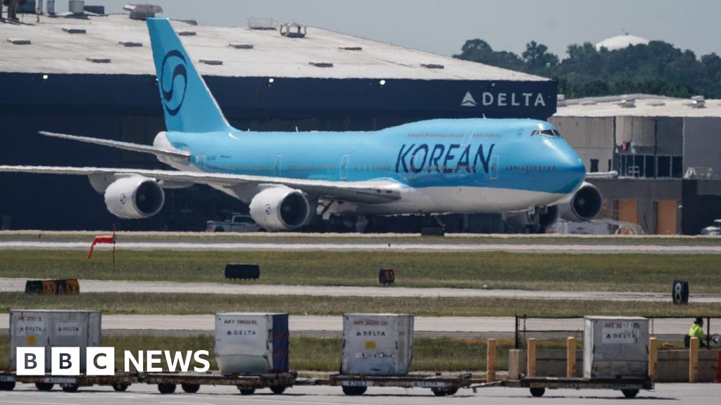 South Korea workers detained in US raid head home