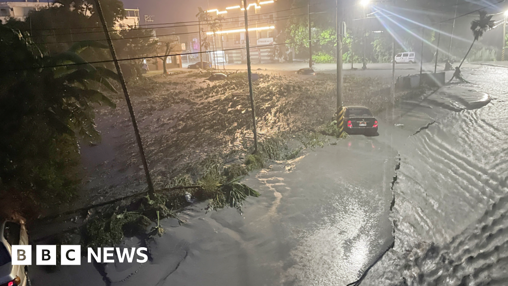 Taiwan lake bursts as year's strongest storm barrels towards China