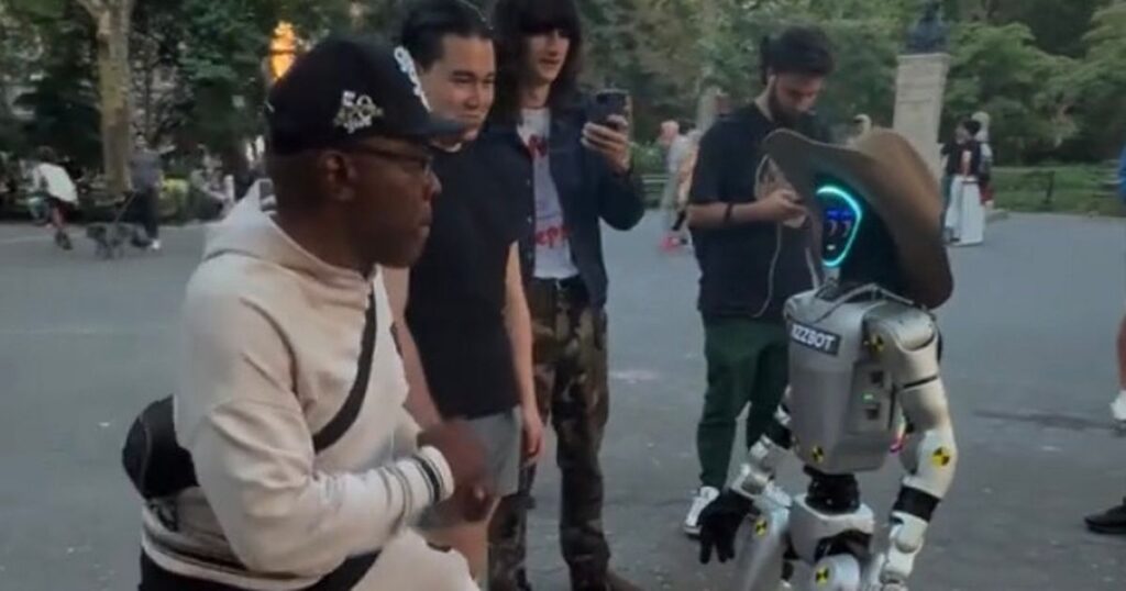 Viral robot filmed 'throwing punches' at people in the street before 'roasting' them