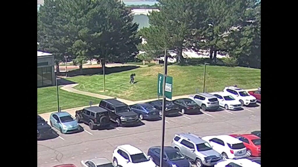 Viral video shows Charlie Kirk assasin fleeing across rooftop moments after fatal shooting