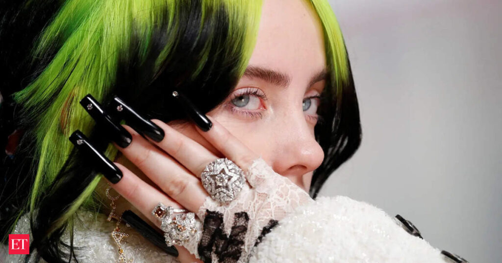 Billie Eilish dragged off stage by fan during Miami concert. Watch viral video