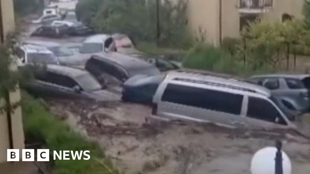 Cars swept away as floods hit country's south-east