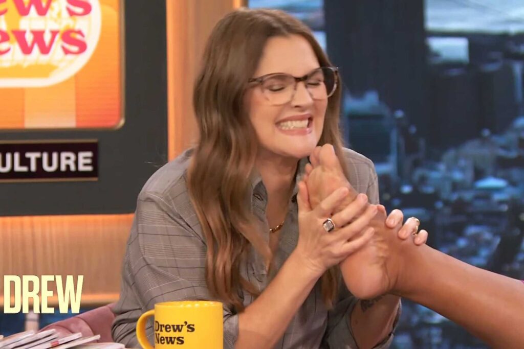 Drew Barrymore reacts to viral talk show foot smelling, sniffs cohosts' feet
