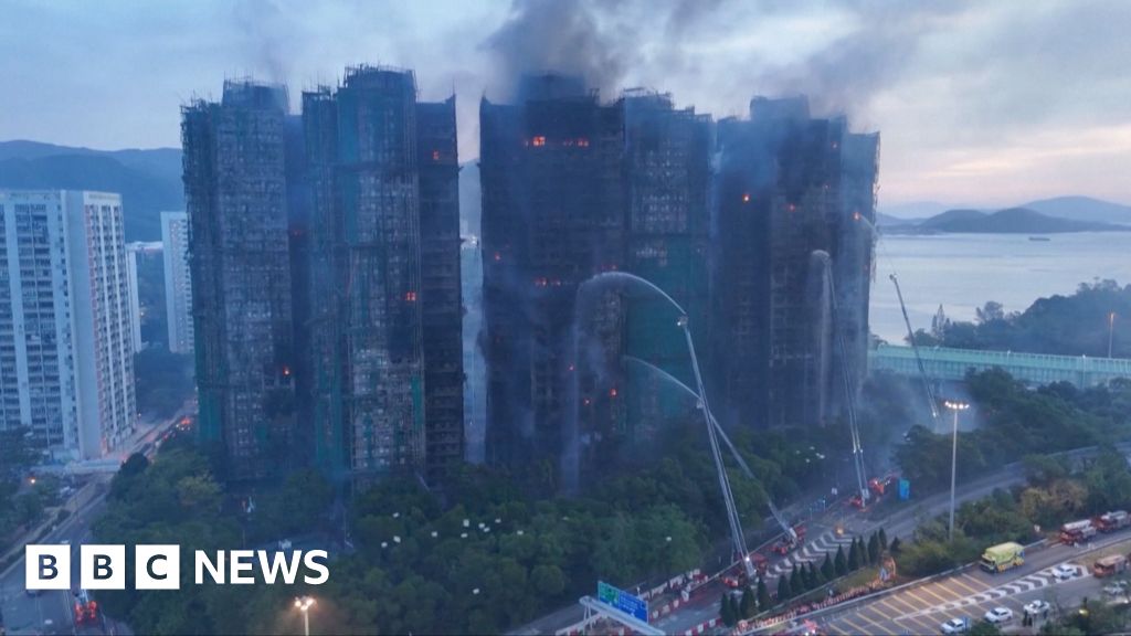 Daybreak aerial footage reveals scale of Hong Kong apartment block blaze