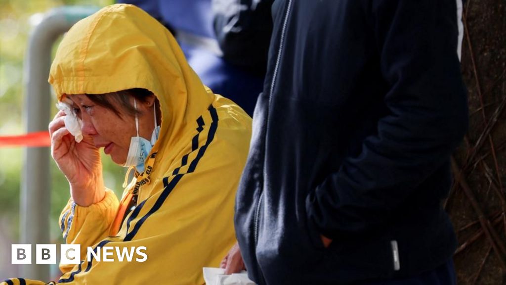 Fury and questions after deadliest blaze in decades