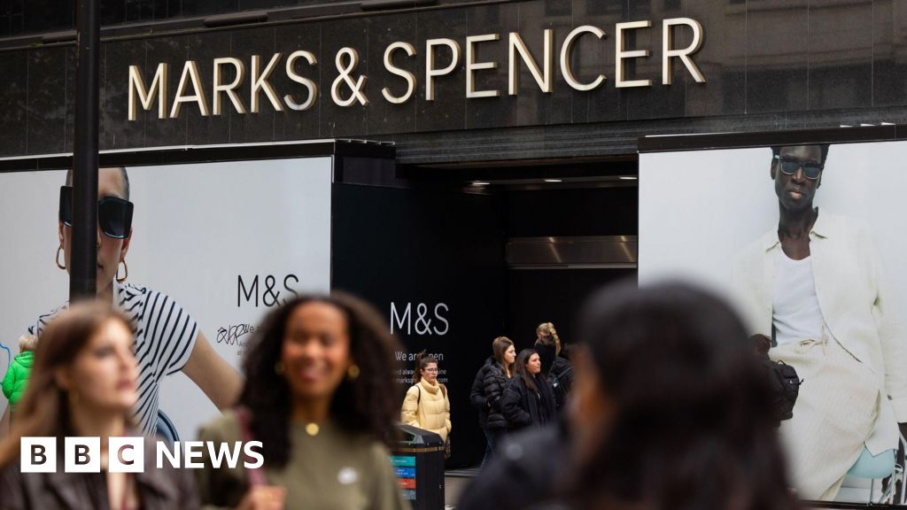 M&S profits halved after cyber attack