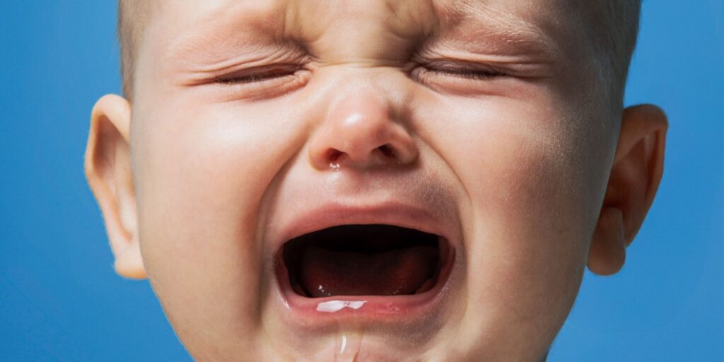 The Download: AI to measure pain, and how to deal with conspiracy theorists