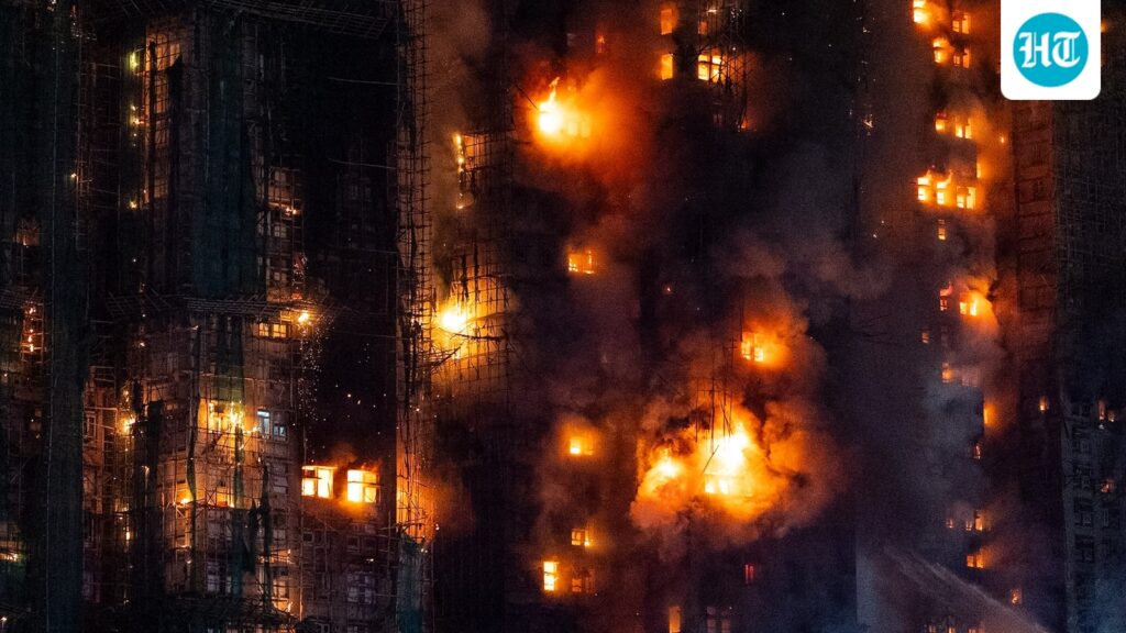 Viral videos of workers seen smoking renew online debate over Hong Kong fire that killed 128