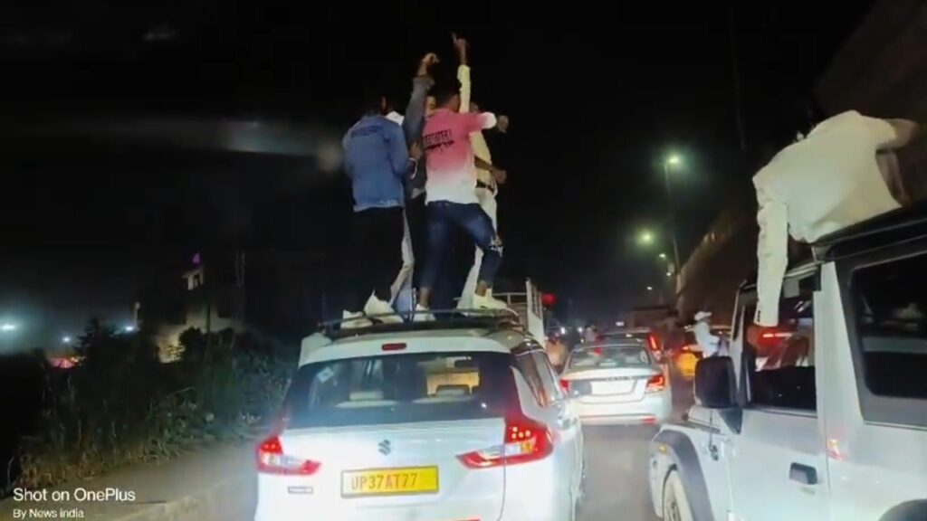 Young men dance atop moving cars during wedding procession in UP, video goes viral