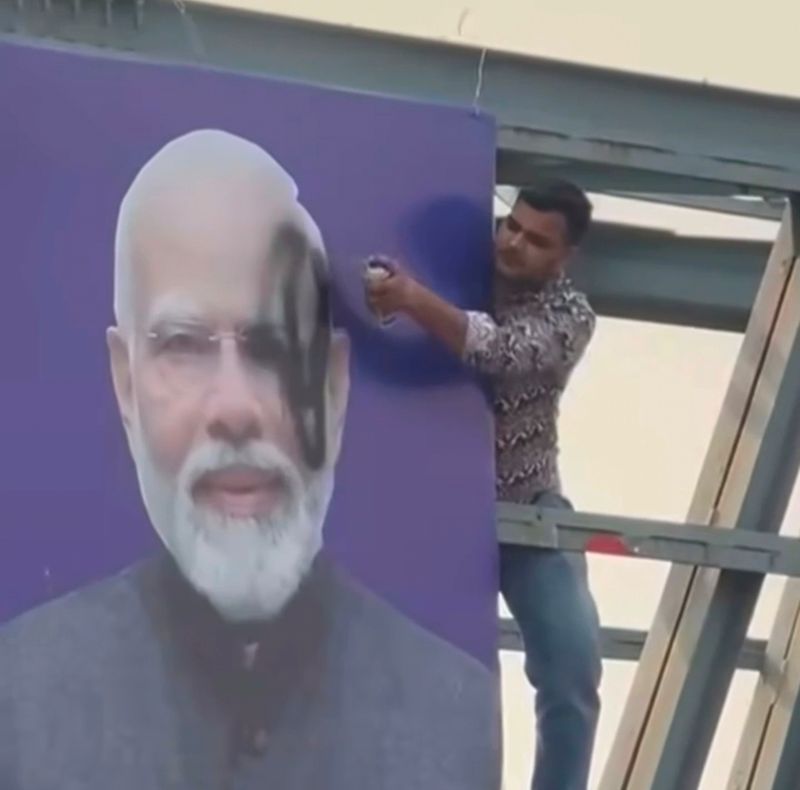 Youth paints PM’s face black on poster, video goes viral
